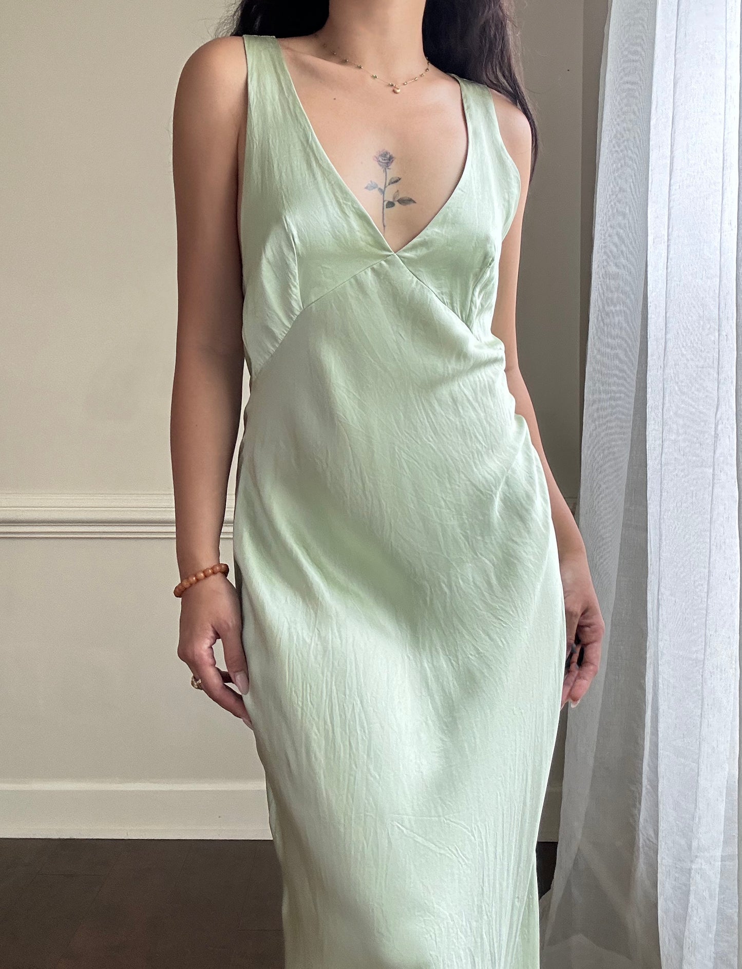 Fairy goddess soft green maxi slip dress featuring deep v neckline