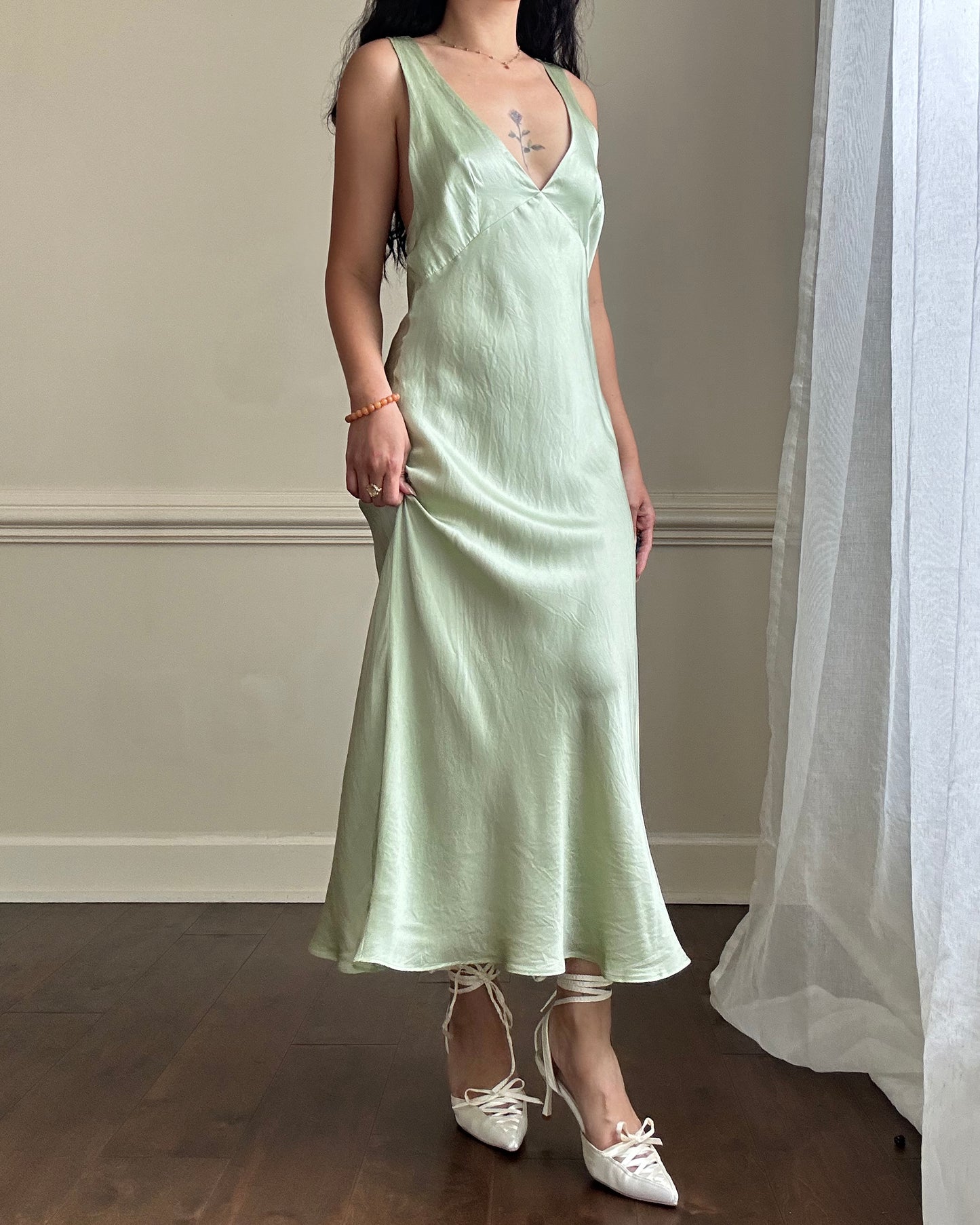 Fairy goddess soft green maxi slip dress featuring deep v neckline