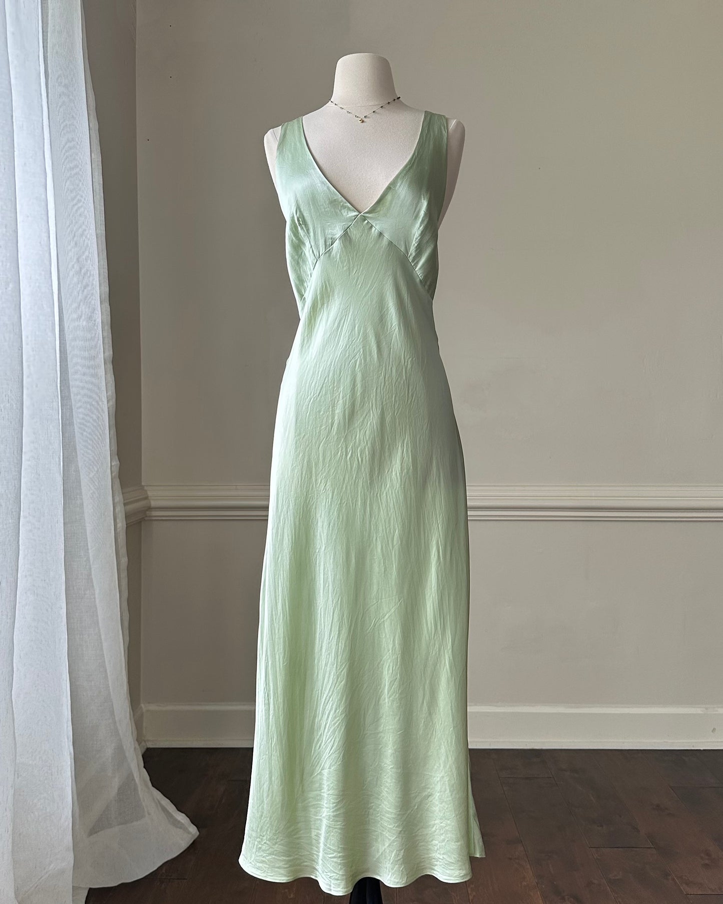 Fairy goddess soft green maxi slip dress featuring deep v neckline