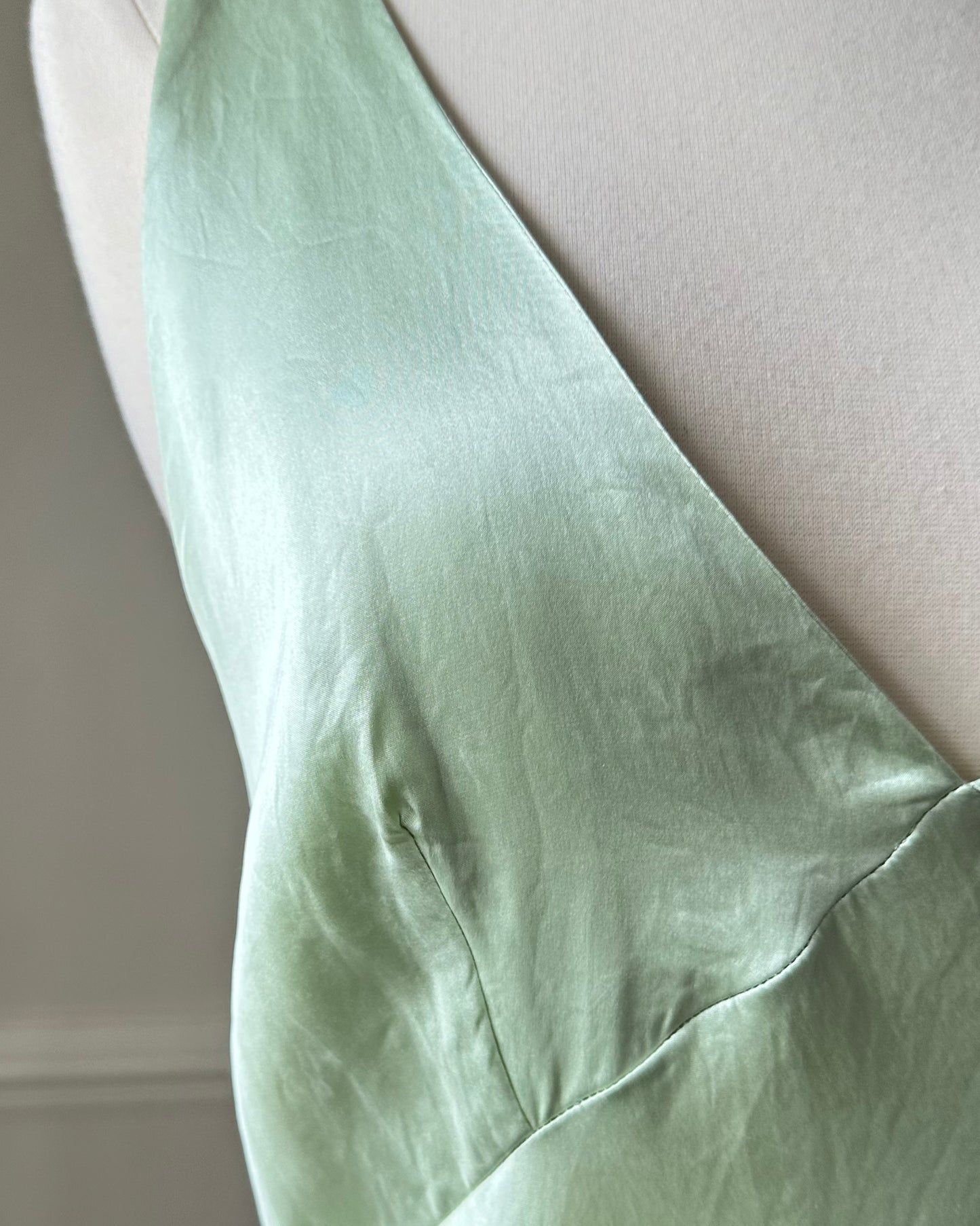 Fairy goddess soft green maxi slip dress featuring deep v neckline