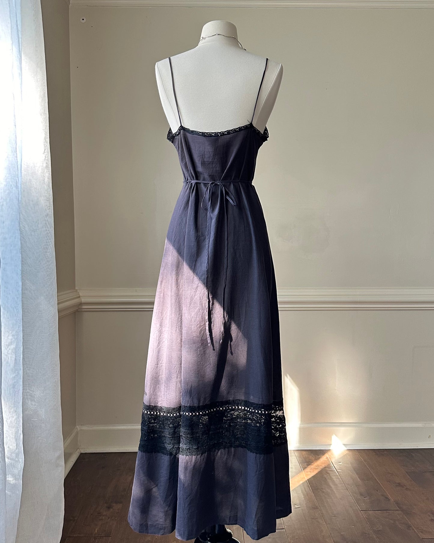 Vintage chic DIOR’s maxi dress featuring open lace top detail with baby pink bow ribbon