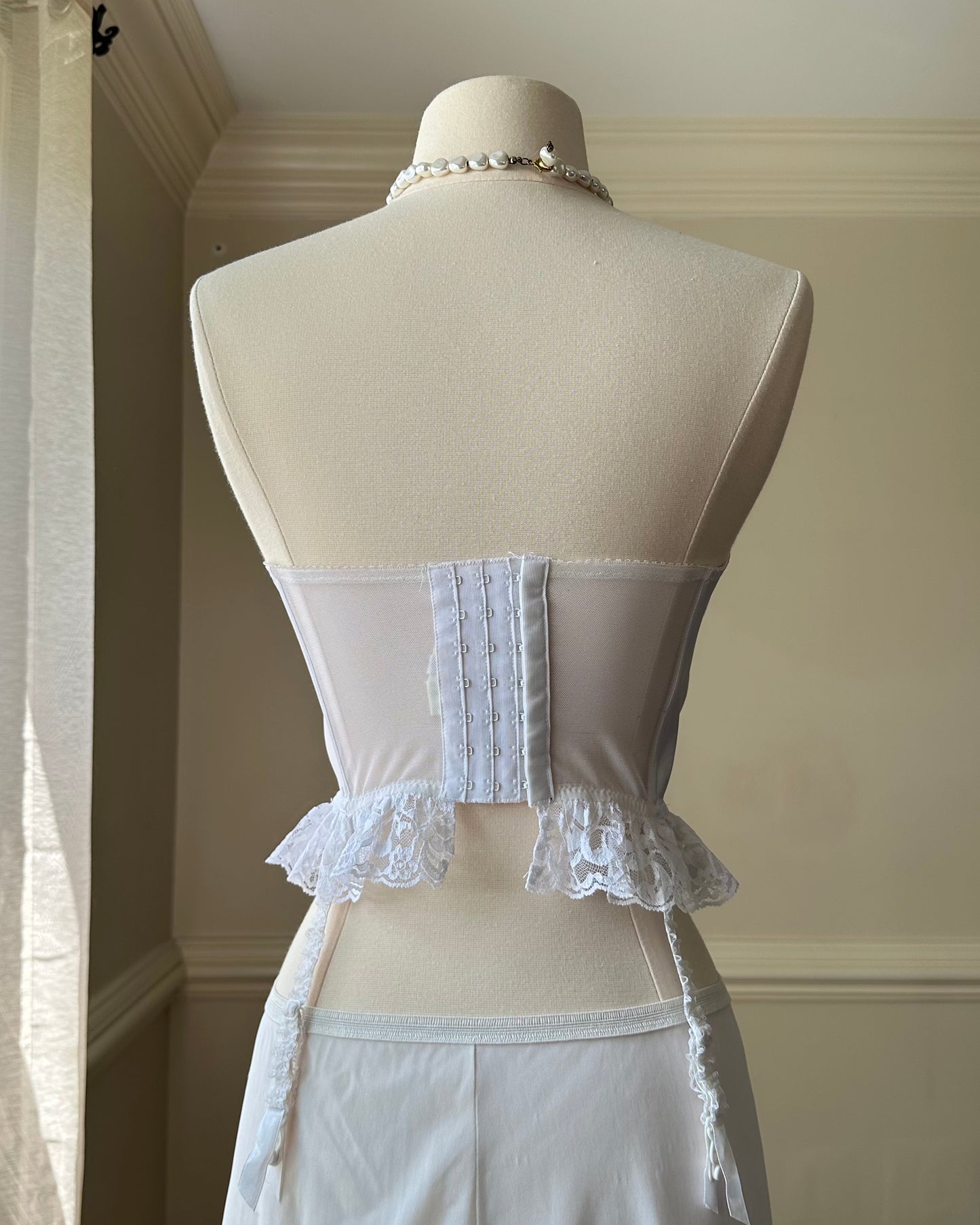 Victoria Secret’s 80's Vintage Strapless Corset featuring Intricate Lace Pattern