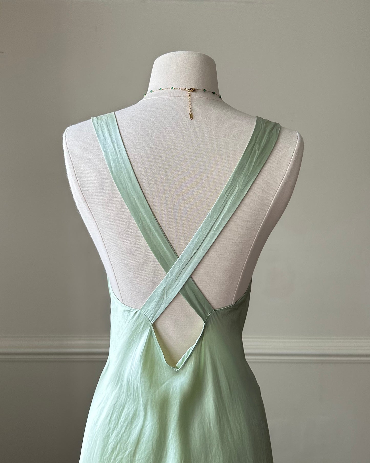 Fairy goddess soft green maxi slip dress featuring deep v neckline