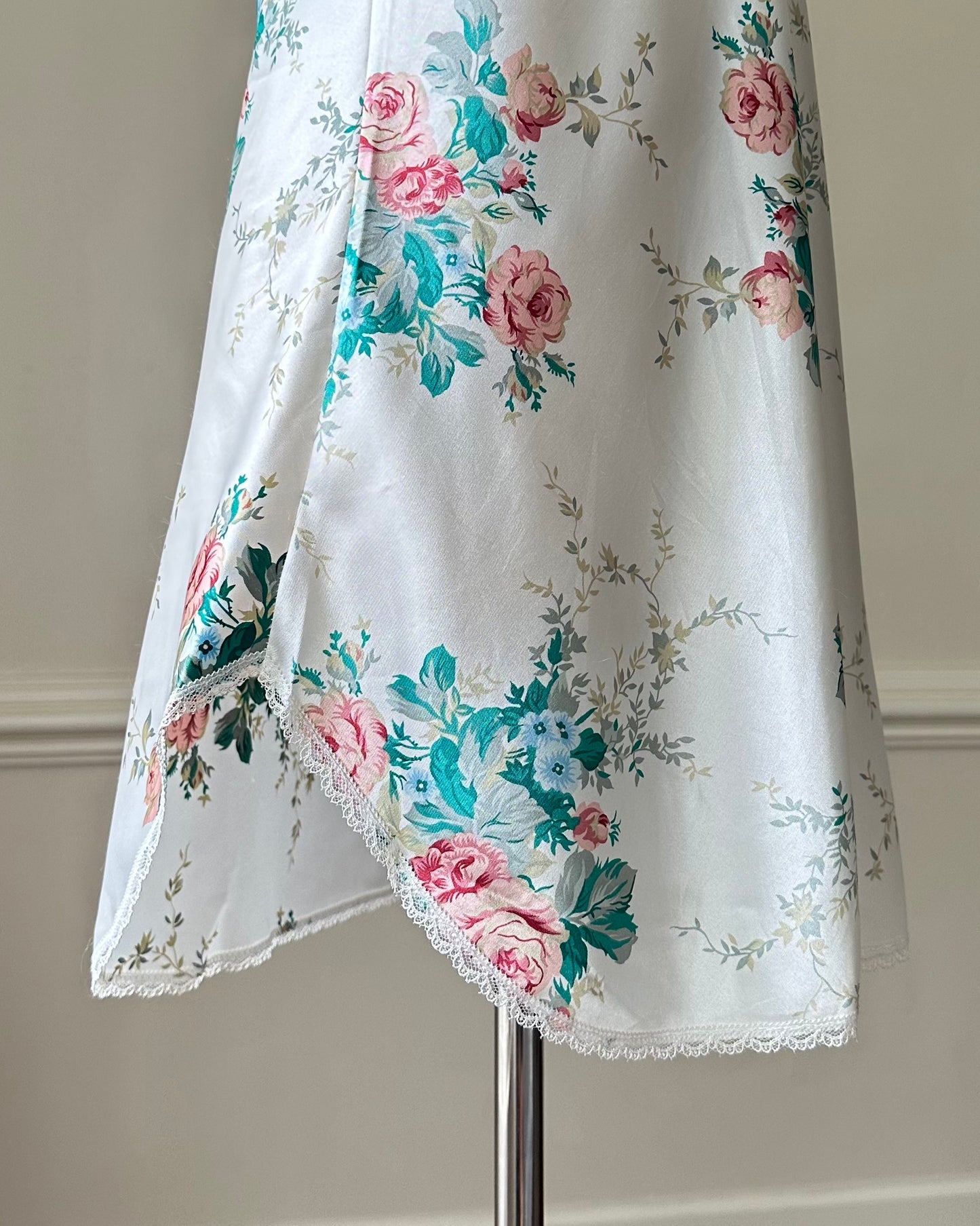 Vintage satin slip dress in white featuring bouquets of roses print