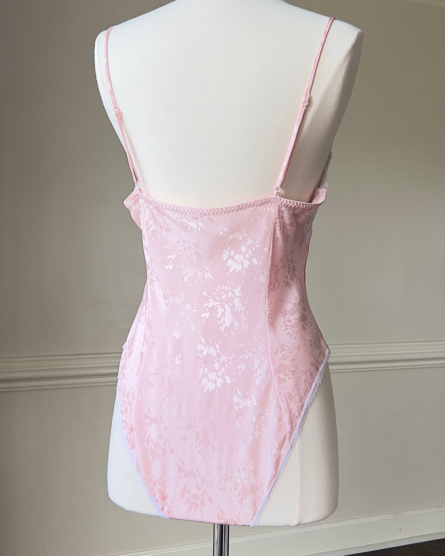 Baby Blushed Bodysuit featuring Lace Trimmings Detail with Embossed Patterned Fabric
