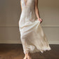 Christian Dior’s ethereal sheer maxi dress in vintage creamy